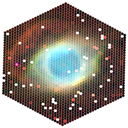 A hexagonal array of circular pixels map the Helix nebular with a round blue core and yellow to orange edge.